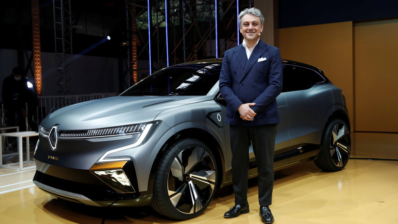 Luca de Meo, Chief Executive Officer of Groupe Renault, poses in front of a Renault Megane eVision car during a news conference about Renault electric strategy during Renault eWays event in Meudon, France, October 15, 2020. REUTERS/Benoit Tessier