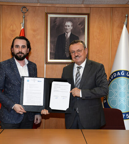 BUÜ Rektörü Prof. Dr. Ahmet Saim Kılavuz ile NSK Otomotiv İcra Kurulu Başkanı Mehmet Kazangil